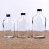 Botella de vidrio plano al por mayor de 50ML100ML200ML botella para jugo de moda botella para té frío botella para café de extracción en frío