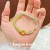2026 Loja de Ouro Mesmo Estilo Ouro Areia Lótus Imitação Jade Hetian Pulseira Trançada Nova Chinesa Primavera Pequena Fresca Doce Pulseira