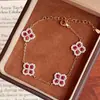 Colgante Flor de Cinco Pétalos Floreciendo en el Palacio Flor de Trébol de Cuatro Hojas Joyería de Mano Estilo Chino Pulsera de Peonía Roja Pulsera de Corindón Rojo