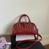 2025 Bolsa Satchel Texturizada de Moda Nicho Retrô Bolsa Almofada 2025 Nova Bolsa Simples de Cor Pura para Comutador com Alça Única Transversal