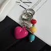 Nuevo diseño de nicho moderno llavero y colgante para bolso con cuentas coloridas en forma de corazón al por mayor