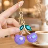 Llavero creativo de aleación de cereza estilo europeo y americano, colgante para bolso estilo Ins, adorno de cereza versátil de moda transfronteriza