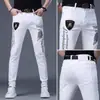 Jeans Blancos Casuales Versátiles Ajustados Skinny Elásticos de Moda para Hombre Estilo Europeo con Pedrería