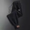 Pantalones Casuales Nuevos de Otoño e Invierno Pantalones Deportivos Holgados Cintura Elástica Pantalones Largos Hombres Modernos Versátiles Pantalones Harem Joggers Hombres
