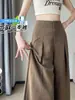 Foto real de los nuevos pantalones anchos holgados de verano 2026, pantalones casuales de cintura alta protectores del sol hasta el suelo, pantalones de lino Tencel para mujer