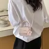 Bolso pequeño cuadrado de estilo coreano de nicho para mujer, nuevo bolso de mano mini simple de moda de lunares versátil para el trabajo, bandolera para niños de moda