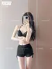 Novo maiô de duas peças 2026 com uma alça só e manga longa para mulheres, apresentando uma saída de praia transparente e shorts modeladores, perfeito para usar na praia, em fontes termais e nas férias.