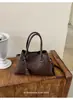 Bolso de mano de alta gama transfronterizo para mujer, nuevo bolso tote retro de moda para el día a día, bolso de hombro y cruzado de gran capacidad, moderno