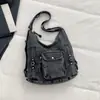 Bolsa de mezclilla casual de gran capacidad para mujer, nuevo modelo 2026, mochila para la ciudad, bolso de hombro y cruzado multiusos, moderno
