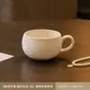 Elegante e simples conjunto de xícara e pires de café com padrão de pedra, caneca e colher para uso doméstico, uso pessoal, xícara para latte art, copo de água