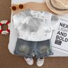 Traje para niño 2025 Ropa nueva para niños y bebés Verano Cuello redondo Tinta salpicada Agujero Manga corta Conjunto de dos piezas