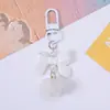 Novos Acessórios Fofos de Laço, Pingentes Coloridos de Resina para Chaveiro, Charms de Bola de Pelo para Bolsa, Exquisitos e Versáteis