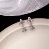 Pendientes de Hueso de Pescado Calientes Transfronterizos Moda Europea y Americana Diseño de Nicho Lujo Ligero Lindos Elegantes Versátiles Dulce Fresco Estilo Joyería