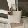 Bolso cubo de moda transfronterizo para mujer, nuevo modelo primavera 2026, bolso de hombro de nicho de alta gama, bolso cruzado versátil