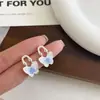 Artículo popular de TikTok: Pendientes de mariposa de cristal de alta gama, lujo ligero, elegantes, modelo nuevo 2026, pendientes exquisitos de nicho para mujer