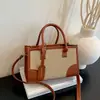 Nova bolsa de ombro color block popular para o início do outono de 2026 para mulheres, bolsa de mão casual da moda, bolsa elegante para o dia a dia, bolsa feminina no atacado