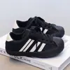 Tênis Esportivo Infantil 2026 Novo Outono Tênis de Skate para Meninas Calçados Simples Biqueira Shell Tênis de Treino Alemão Tênis da Moda para Meninos Estilo Coreano