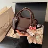Bolso de Mano de Moda Tendencia Mujer 2026 Invierno Nuevo Estilo Coreano ins de Moda Simple Versátil Bolso Cuadrado Pequeño Bolso de Hombro