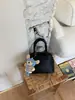 Mini Bolso de Concha para Mujer 2026 Nuevo Nicho de Gama Alta Bolso de Bolos de Moda Mini Bolso de Mano Bolso Bandolera para Mujer