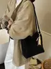 Bolso Retro de Nicho con Estampado de Leopardo para Otoño e Invierno para Mujer 2025 Nuevo Bolso de Hombro Axila de Moda para Viajes Bolso Tote Cubo