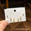 Set para el cuidado de las orejas de plata S925 Flor Trébol de cuatro hojas Exquisito Versátil Sensación de alta gama Una tarjeta Tres pares de aretes Venta al por mayor Moda