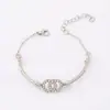 Estilo Moda Europeu e Americano Flor Trevo de Quatro Folhas Pulseira Feminina Versátil Pulseira Radiante com Diamantes Brilhantes Cheia de Diamantes com um Toque de Luxo
