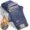 Venta al por mayor de jeans gruesos con forro polar para otoño e invierno para hombre, pantalones de pierna ancha de cintura alta, pantalones casuales de negocios rectos holgados y elásticos para hombre