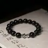 Pulseira de Contas Esmaltadas Dez Mil Milhas Devora Besta Dourada Pulseira Pixiu Banhada a Prata Obsidiana Negra Anti-Sensação de Alto Padrão Design de Nicho Pulseira de Contas de Oração Budista