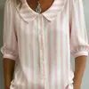 Nova Camisa Europeia e Americana Cruzada Amazon Primavera/Verão 2026 Solta Casual Vintage Botão Bordado Floral Manga Média