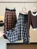 Falda de cuadros retro irregular para mujer, nuevo diseño de otoño, de cintura alta, cuadros patchwork, falda midi acampanada