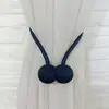 Fábrica de origen stock correa de hebilla magnética de cortina de bola enrollada a mano sala de estar todo partido simple sin perforación hebilla de cortina