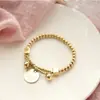 Pulsera de disco con letra de lujo ligero europeo y americano estilo frío ins diseño simple de nicho pulsera de moda retro venta al por mayor