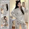 Novo pijama de malha canelada de seda gelada com mangas curtas e calça longa para mulheres, adequado para primavera, outono e verão, com um design fofo de desenho animado e modelagem solta