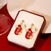 Pendientes de Conejo Lindo de Aguja Plateada para Año Nuevo Artículo Caliente de Año Nuevo Estilo Chino Rojo Buena Suerte y Prosperidad Pendientes Festivos de Dibujos Animados