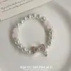 Princesa em Fuga Pulseira de Pérolas com Laço Rosa Estilo Doce Exquisito de Menina Rica Novo Estilo Item Quente Toque de Luxo Joia de Mão