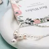 Accesorios de Principios de Primavera Nuevo Collar Dulce de Perlas de Imitación Plata Rota Cadena para Clavícula Diseño de Nicho Aleación Femenina de Gama Alta