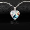 Venta caliente de Temu collar de cristal nuevo transfronterizo Collar de mariposa dorada azul rosa en forma de corazón collar de vid de temperamento