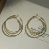 Brincos Europeus e Americanos de Design Exclusivo de Alta Qualidade com Acabamento Fosco, Argolas Circulares em Formato de Cruz, Simples e Estilosos, Brincos Ousados e Elegantes para Mulheres