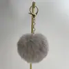 Venta Directa de Fábrica Colgante de Bola de Pelo de Conejo Sintético Accesorios para Mascotas Materiales para Juguetes Colgante para Bolso Llavero Bola Redonda