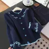 Cardigan de tricô jacquard com bloqueio de cor e laço, estilo coreano, novo para outono e inverno, gola redonda, elegante, rejuvenescedor, jaqueta suéter versátil para mulheres
