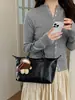 Colección nueva Otoño 2026: bolso de mano casual versátil con un look sofisticado, diseño simple, perfecto para ir al trabajo, y un bolso de hombro de moda, de nicho para mujer