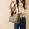 Bolsa de Mano 2026 Nueva Bolsa de Otoño e Invierno para Mujer de Alta Gama Piel Genuina Gran Capacidad para Viajar al Trabajo Hombro Axila Equipaje