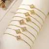 Pulsera de Lujo Ligero de Alta Gama para Mujer Aogu, Cobre Chapado en Oro de 18 Quilates con Incrustaciones de Circonita, Diseño de Flor Hueca, Suministro de Comercio Exterior