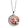 Cazador de demonios: Kimetsu No Yaiba Kamado Nezuko Collar de Luna Giratoria Periférico de Anime Colgante Giratorio de Doble Cara Cadena para Suéter