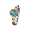 Anillo de estilo europeo con piedra principal ovalada de aguamarina, aro de luz, sensación de lujo de alta gama, diseño denso de pavé con pequeños diamantes en ambos lados