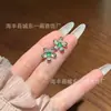 Atacado do Fabricante: Brincos de Floco de Neve Verde Naturais do Xiaohongshu com Inlay de Prata S925, Design Fresco e Versátil