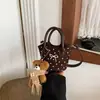 Bolso de mano para niña con diseño de lunares de nicho coreano, lindo bolso cruzado de dibujos animados para bebé, bolso infantil con lazo de perlas
