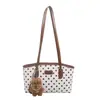 Bolso de mano elegante y versátil para mujer, nueva colección 2026, moderno y chic, adecuado para ir al trabajo, bolso de hombro, diseño de lunares, se puede llevar debajo del brazo