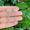 990 Plata Pura Filigrana Flor de Ciruelo Joyería de Plata Nudo de Lazo Borla Pendientes Estilo Largo Pendientes de Plata Elegantes Estilo Transmisión en Vivo