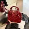 Bolsa Feminina Textura Moderna Comércio Exterior 2026 Nova Xadrez Concha Versátil Ombro Único Sobrancelha Bolsa de Mão para Senhoras